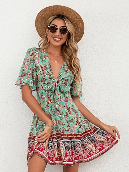 Boho Floral V-Neck Mini Dress – Lace-Up Waist & Flounce Sleeves